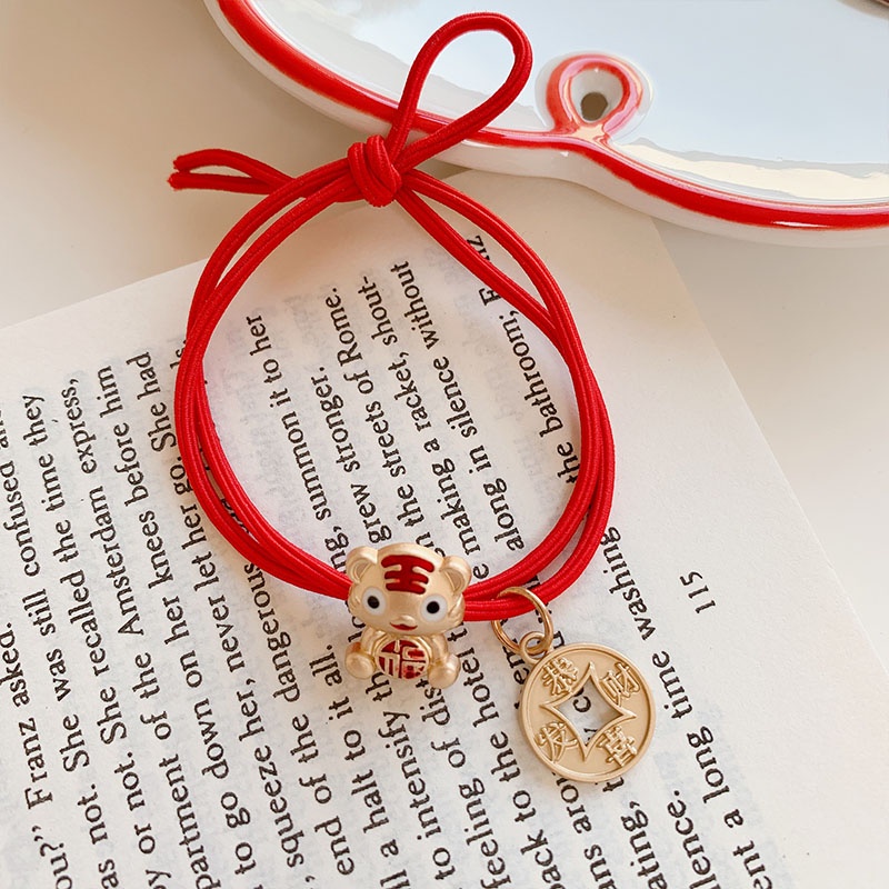 Dây buộc tóc cao su màu đỏ phối mặt hợp kim thời trang