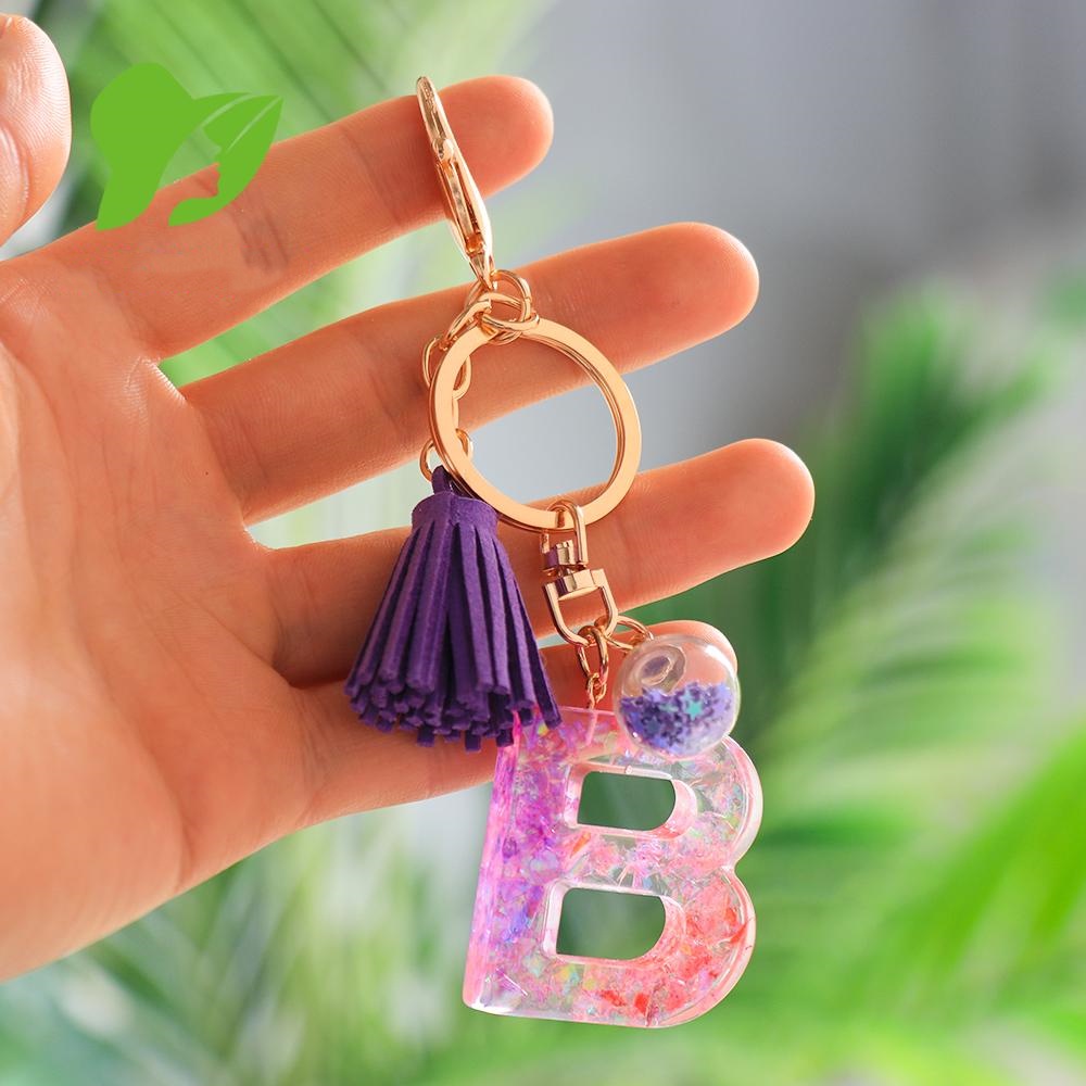 Mới Móc Khóa Nhựa Họa Tiết Chữ Tiếng Anh Lấp Lánh Gắn Núm Tua Màu Tím Thời Trang