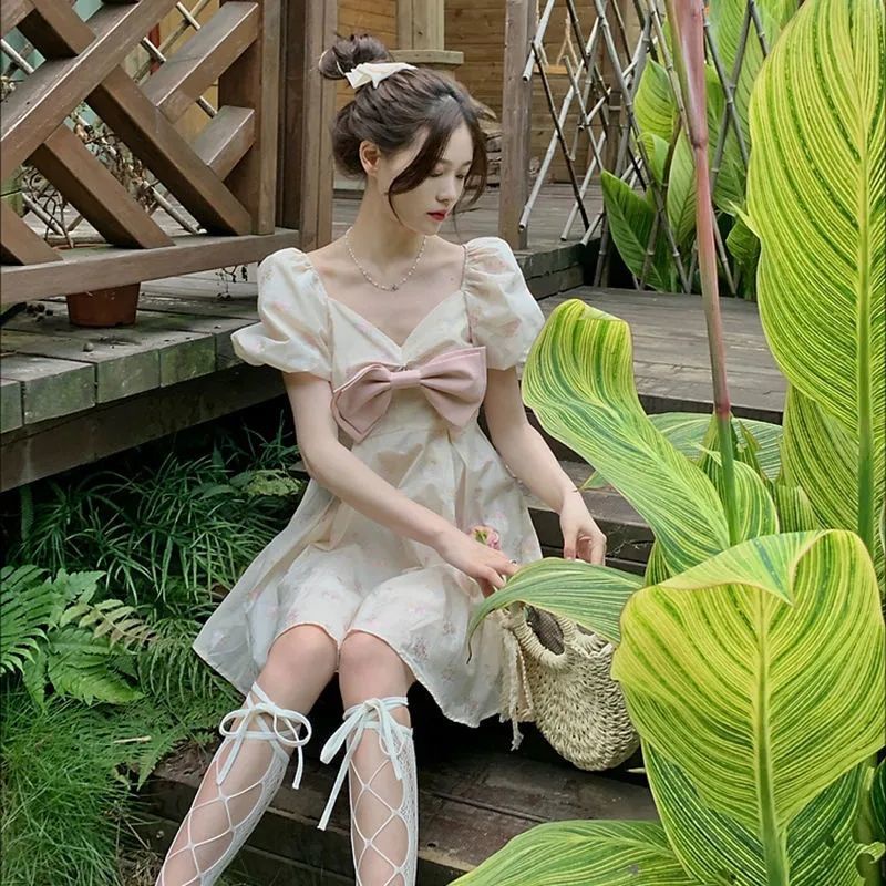 Đầm Ngắn Tay Phồng Đính Nơ In Hoa Thời Trang Mùa Hè Pháp 2022