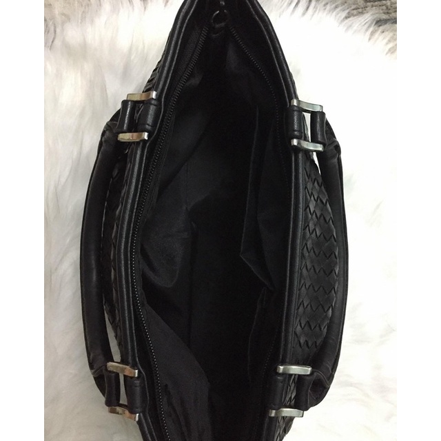 Túi cầm tay da đan