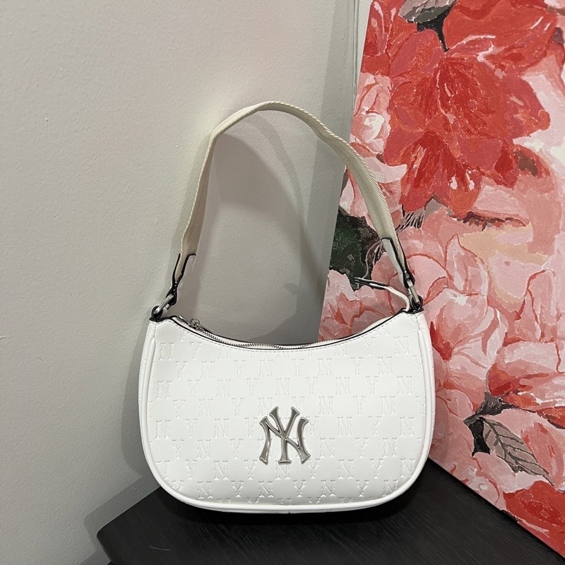 | TQXK | TÚI KẸP NÁCH DA MONOGRAM M.L.B KIM LOẠI