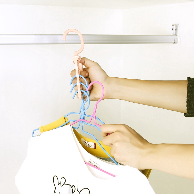 Multifunctional five-hole hanger with handle that can be rotated 360 degrees to complete the hanger