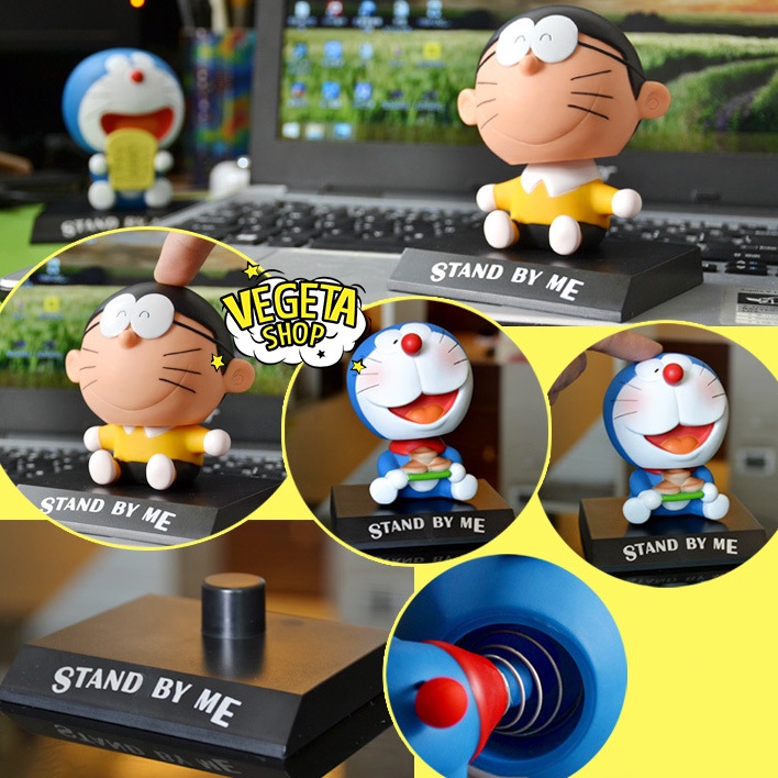 Mô hình mèo ú Doraemon Doremon gật gù trang trí - Giá đỡ điện thoại bàn làm việc bàn học tủ sách taplo ô tô quà tặng