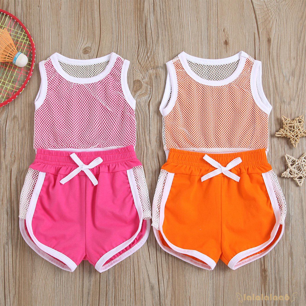 Set Áo Thun Sát Nách Cổ Tròn + Quần Short Xẻ Tà Màu Sắc Tương Phản Cho Bé Gái 6 Tuổi