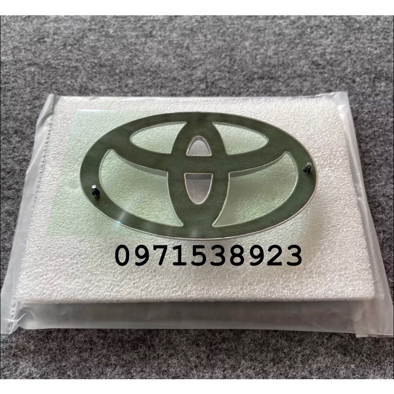 LOGO TOYOTA KÍCH THƯỚC 12cm*8,2cm XỊN CHÍNH HÃNG 90975-02063