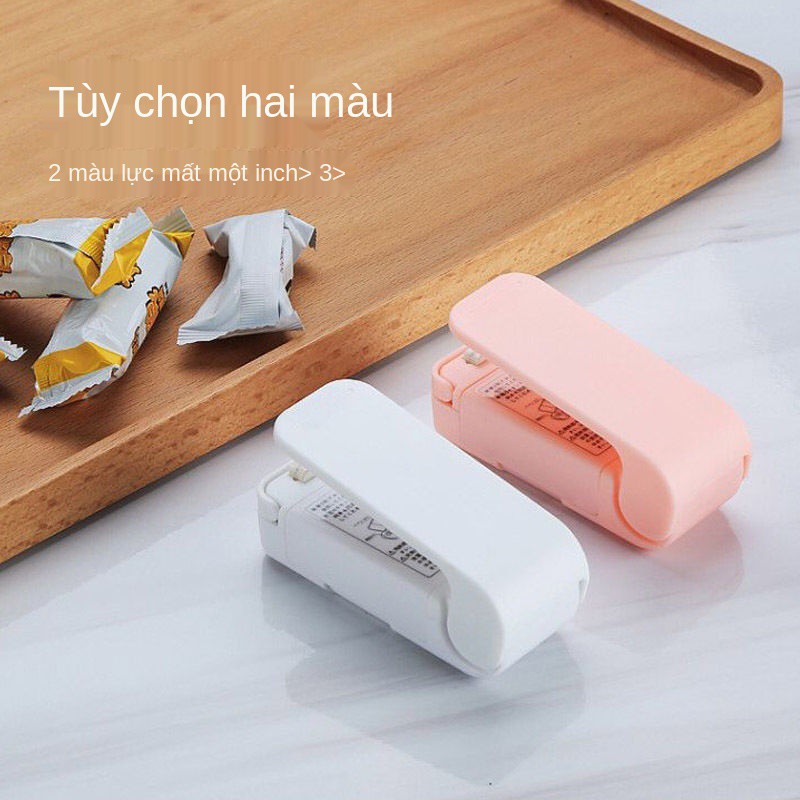 máy dán loại áp lực tay cầm mini đóng gói túi nhựa bao bì đồ ăn nhẹ gia đình nhỏ hàn niêm phong tạo tác