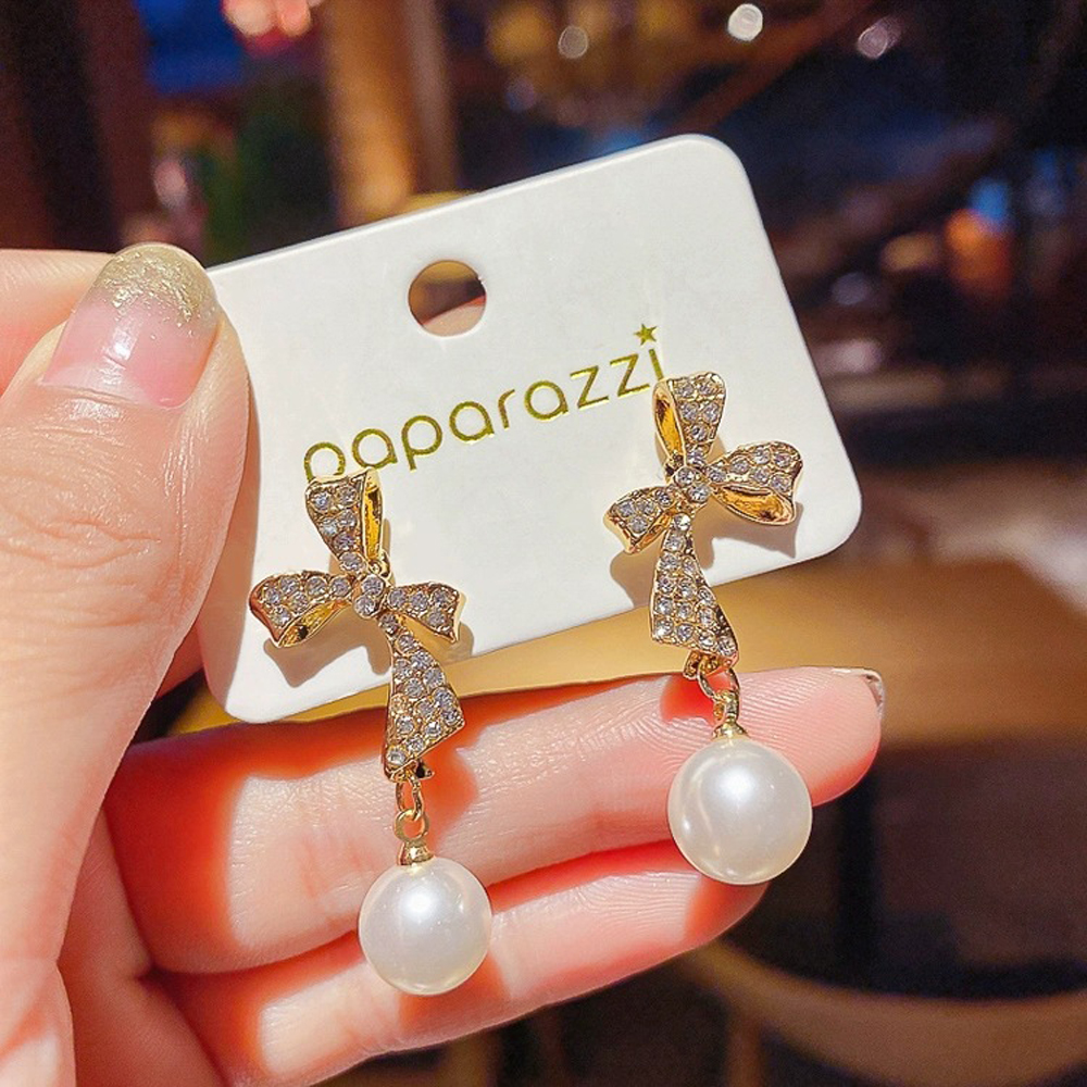 Đôi khuyên nơ đính hạt ngọc trai và đá giả thời trang cho nữ