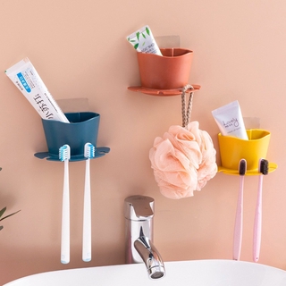 Toilet essential magic device to receive toothpaste toothbrush hanging cloth without holes