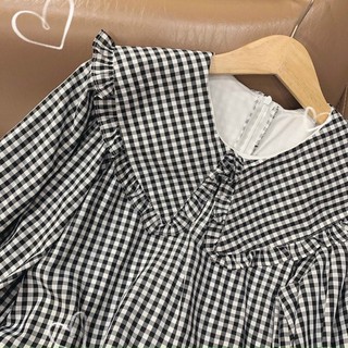 Đầm caro đen trắng cổ sen