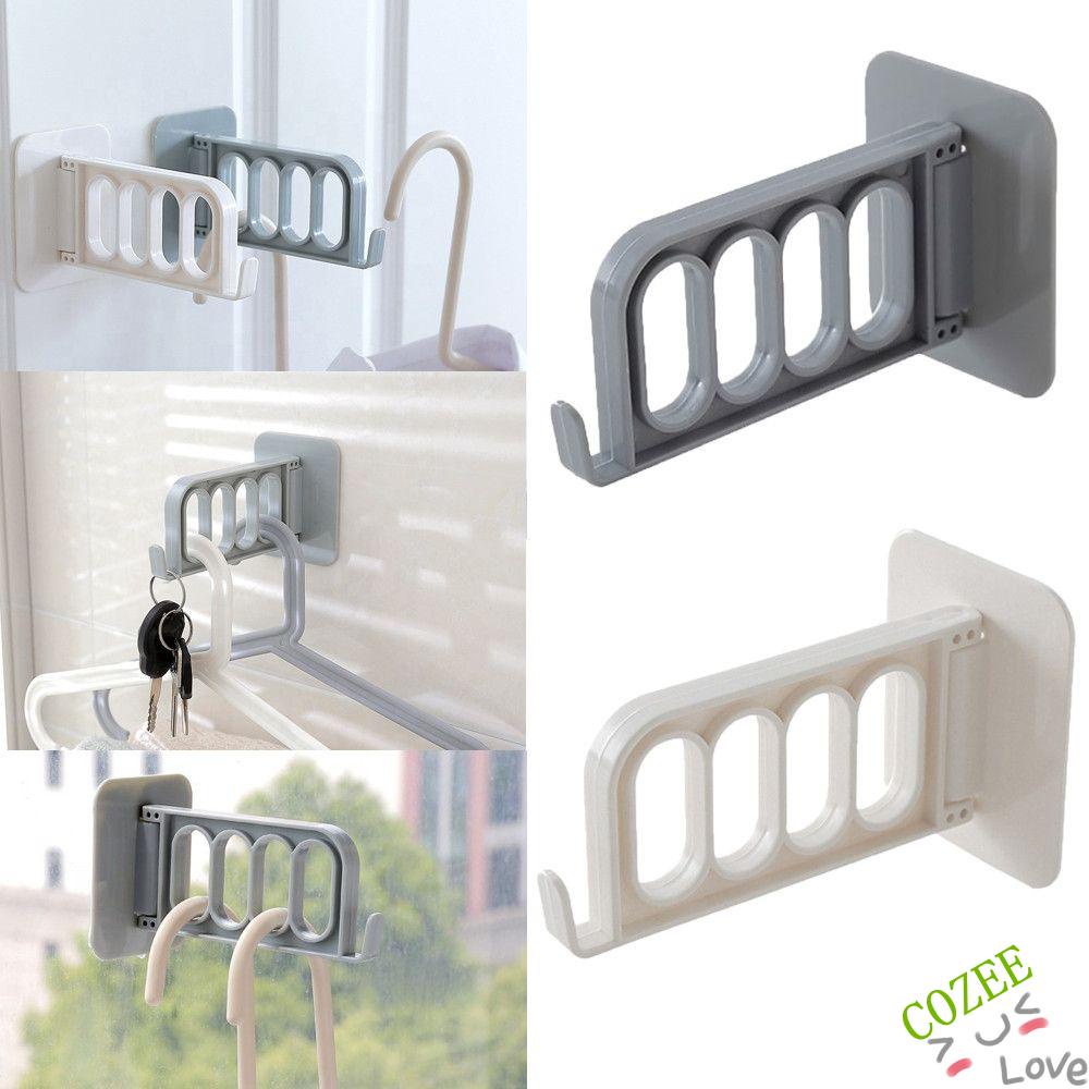 Móc treo quần áo 4 lỗ bằng nhựa có thể gập lại đa năng tiện dụng cho nhà tắm