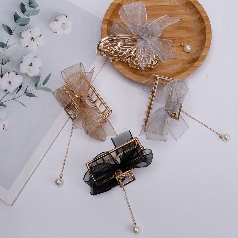 Dây buộc tóc đính ngọc trai và tua rua