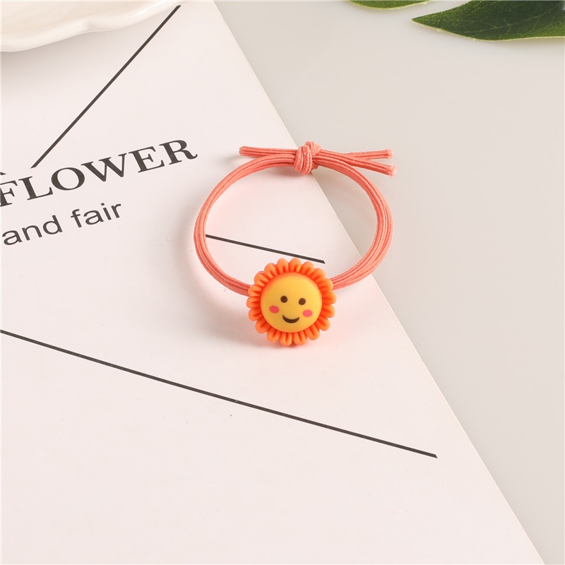 Dây buộc tóc hoa mặt cười xinh xắn  Clovershop68