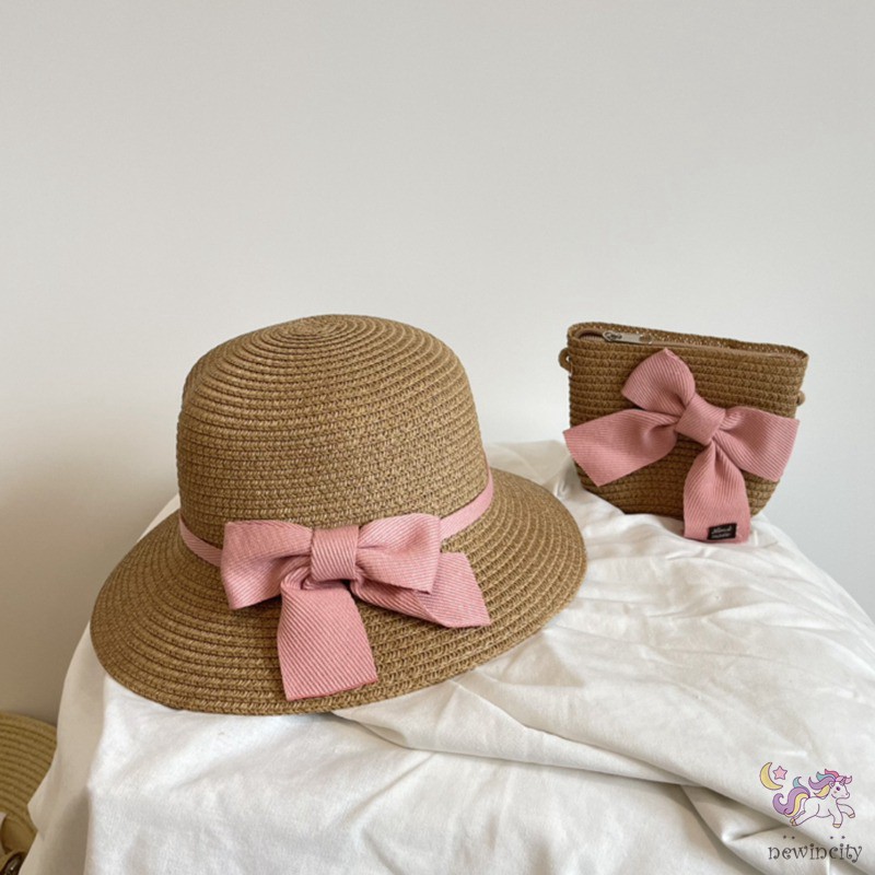 Set mũ vành và túi xách đan cói đính nơ thời trang mùa hè đáng yêu cho bé gái