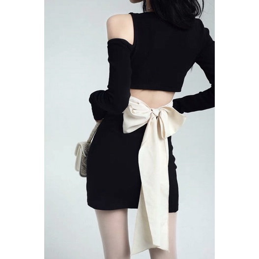 Đầm body đen nơ hồng cho bé