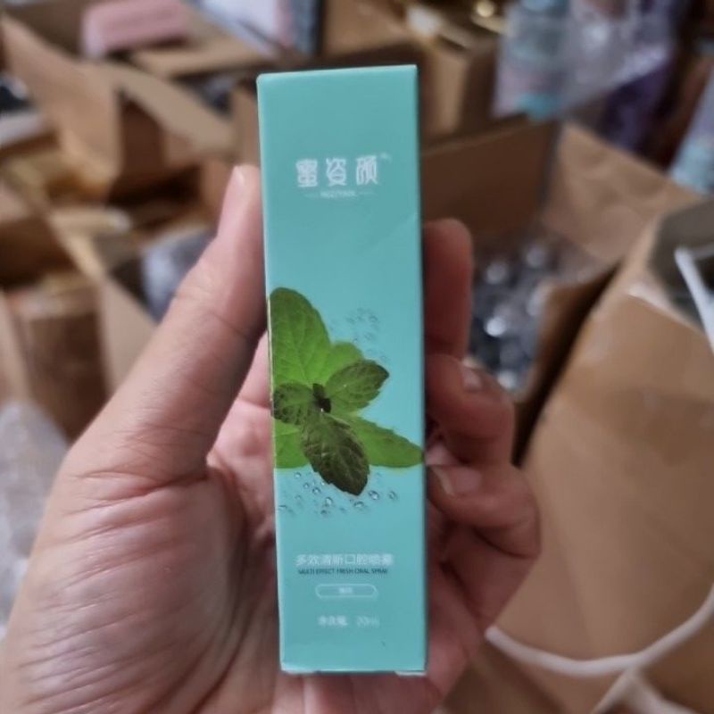 Xịt thơm miệng kháng khuẩn chính hãng nội địa Trung hương bạc hà the mát và đào ngọt