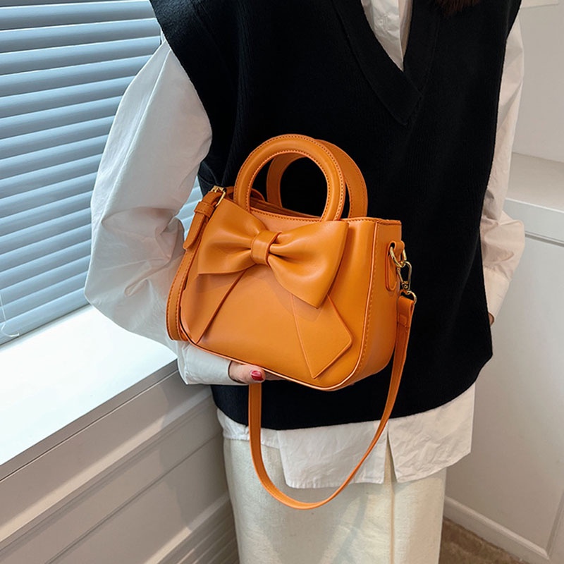 Túi đeo chéo IELGY hình vuông nhỏ đính nơ cầm tay dễ phối đồ thời trang cho nữ