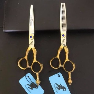 Bộ kéo cắt tóc Nhật bản Freelander FR05 ( Mua một bộ kéo được tặng bao da+lọ dầu+khóa kéo+2lược)