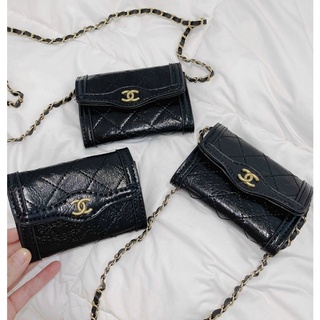 Ví cầm tay đeo chéo mini tag x da bóng