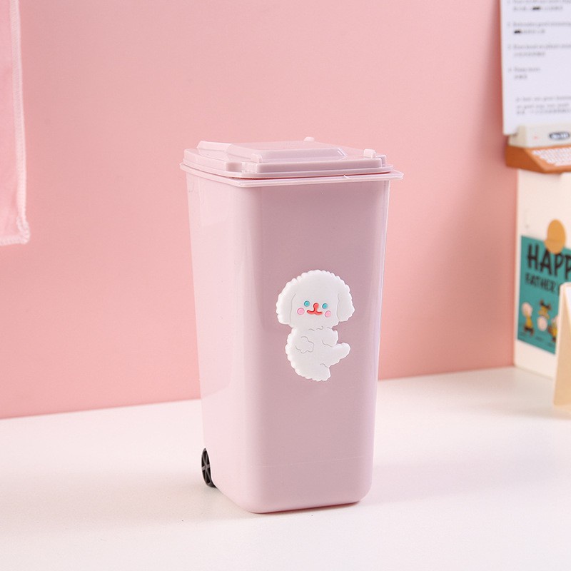 Thùng rác mini để bàn kiêm hộp bút màu hồng có bánh xe và nắp siêu cute dễ thương