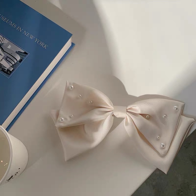 Nơ kẹp tóc màu kem đính hạt phong cách dịu dàng N50