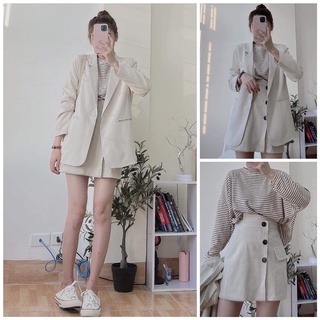 Chân váy 3 cúc đen dọc