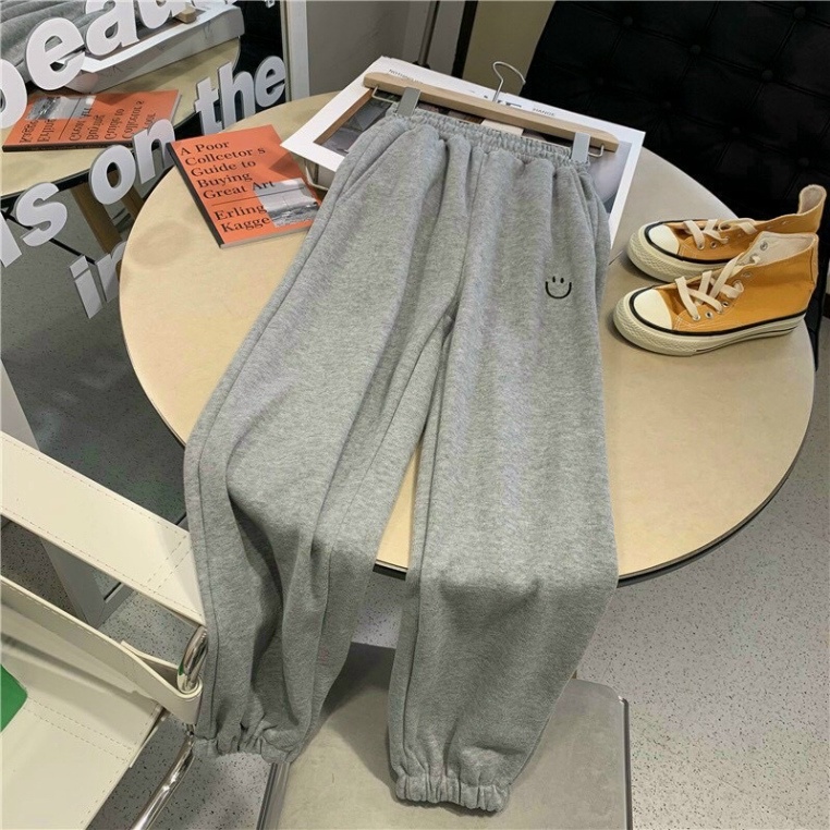 Quần Nỉ Unisex Mặt Cười Lưng Thun Ống Bó Chun