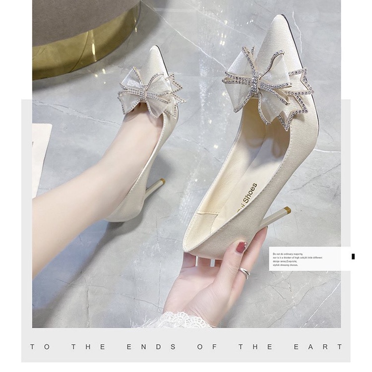 Giày cao gót Trắng, mũi nhọn gắn Nơ ren viền đính đá 9p