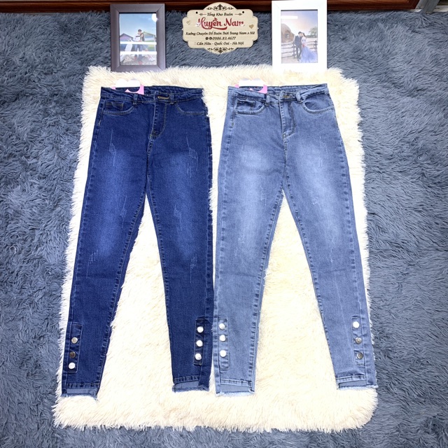 quần bò lệch gấu đính khuy chân | BigBuy360 - bigbuy360.vn