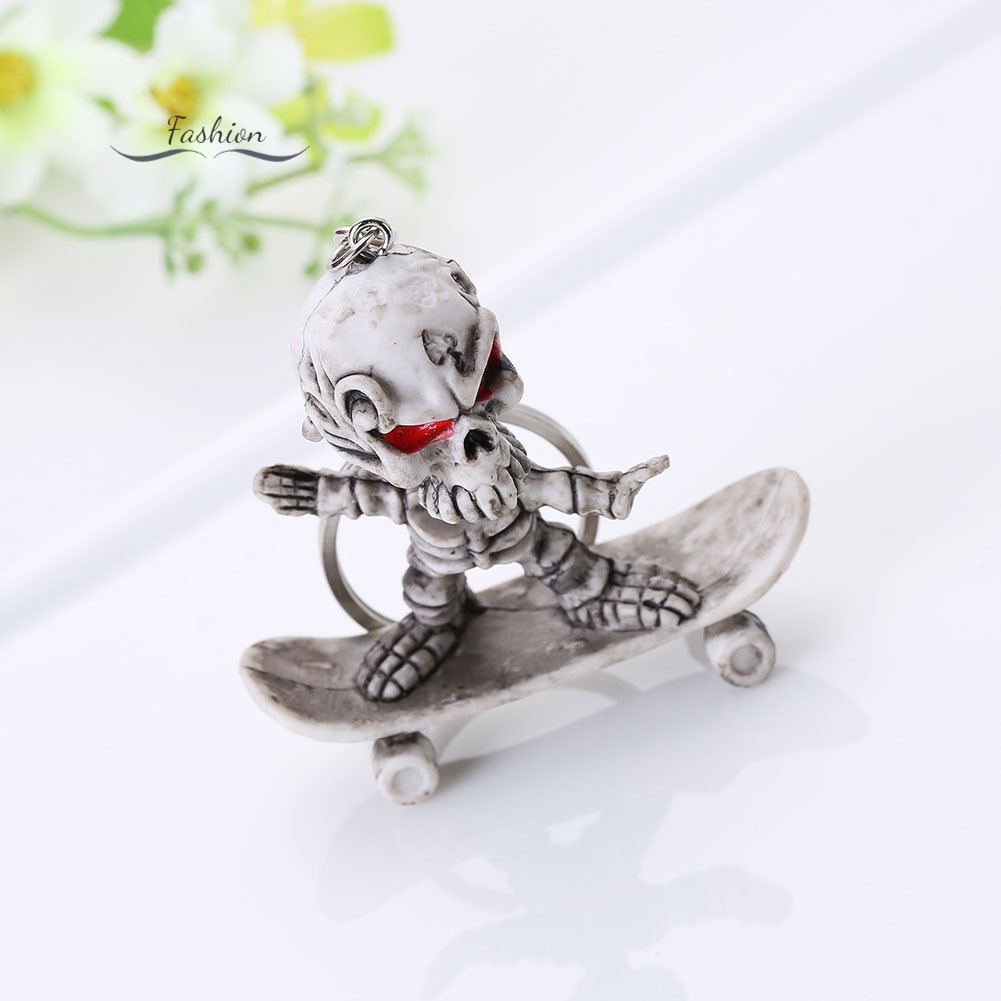 Móc khóa mặt hình bộ xương chơi ván trượt đáng yêu độc đáo treo túi xách chìa khóa xe hơi