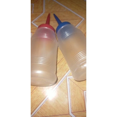 Bình đựng dầu máy  12 chai