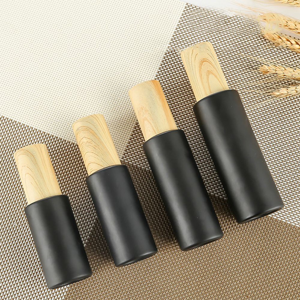 Chai thủy tinh màu đen nắp gỗ đựng mỹ phẩm cho du lịch