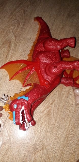 Khủng long chạy PIN 2 đầu có cánh và đẻ trứng có nhạc đèn Led tặng kèm PIN