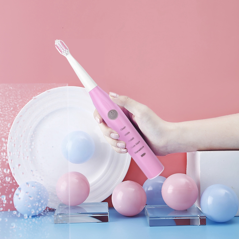Bàn chải đánh răng điện siêu âm có thể sạc pin với 4 đầu bàn chải