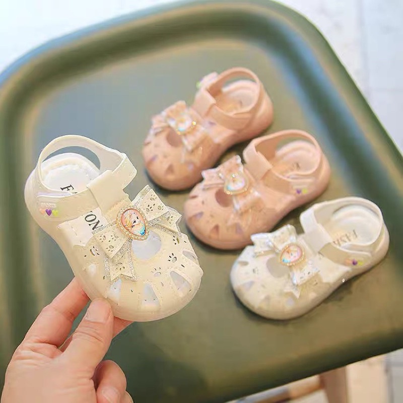 Sandal có nơ elsa cho bé gái (sz15-sz25) - Dép quai hậu rọ tập đi cho bé da Pu đế dẻo êm chân có quai dán nơ điệu đà 661