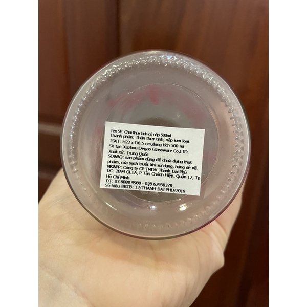 Bình thuỷ tinh  500ML nắp vặn kèm túi giữ nhiệt .
