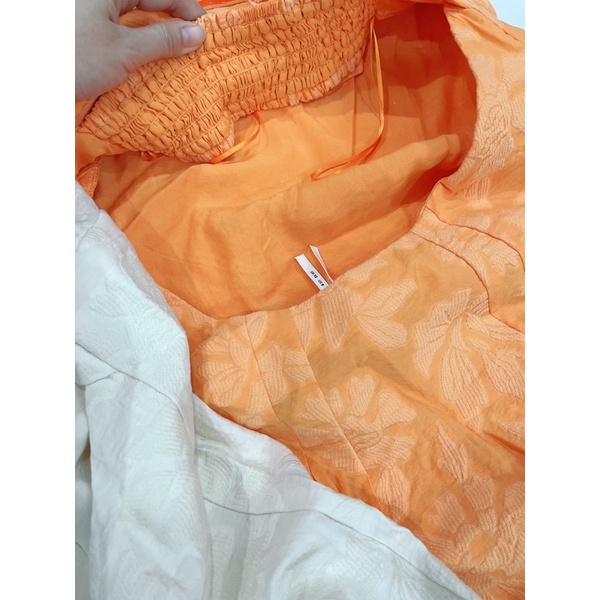 Đầm cúp ngực nơ sau xuất dư xịn