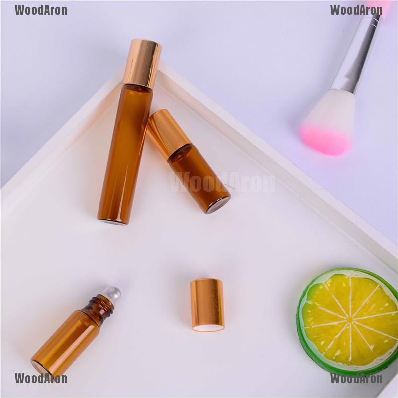 Bộ 5 chai thủy tinh rỗng đựng nước hoa/tinh dầu màu hổ phách 5/10ml | BigBuy360 - bigbuy360.vn
