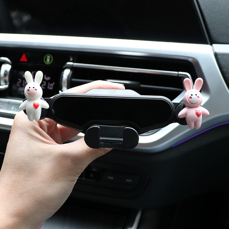 giá đỡ điện thoại di động trên ô tô ổ cắm gió đa chức năng định vị đứng hoạt hình sáng tạo hỗ trợ trọng lực tự