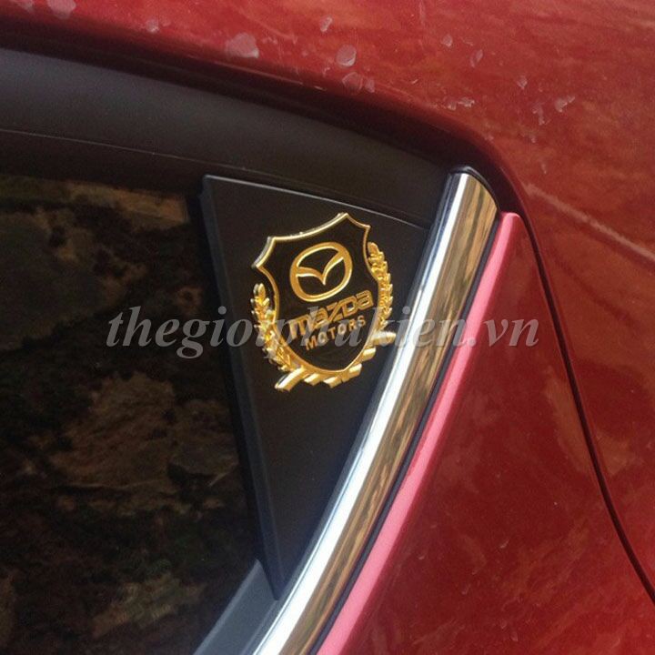 Bộ 2 Logo dạng Bông lúa theo xe- Mazda( hàng chất )( hàng chất )