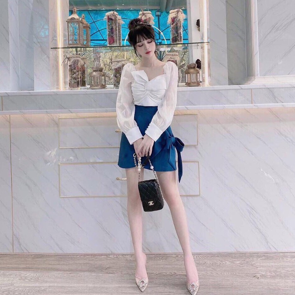 Sét Đồ Bộ Kiểu Nữ Hot Trend Hàn Quốc Áo Tay Dài Xoắn Ngực & Chân Váy Phối Nơ
