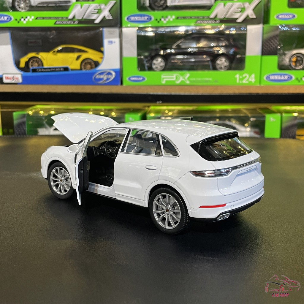 Mô hình xe ô tô Porsche Cayenne Turbo Hãng Welly FX tỉ lệ 1:24 màu trắng