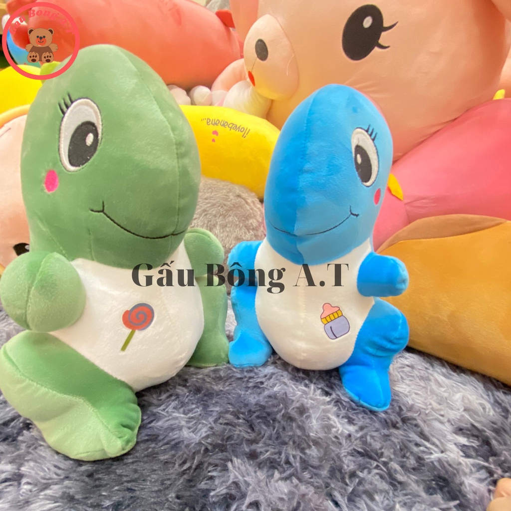 Gấu Bông Khủng Long Ngồi má hồng,ngực in hình siêu cute đáng yêu hai màu xanh - hồng size 30cm