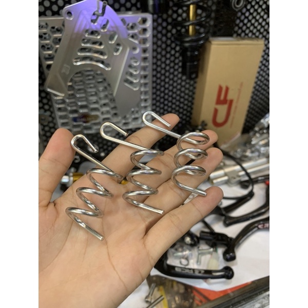 Lò xo inox bắt dây dầu