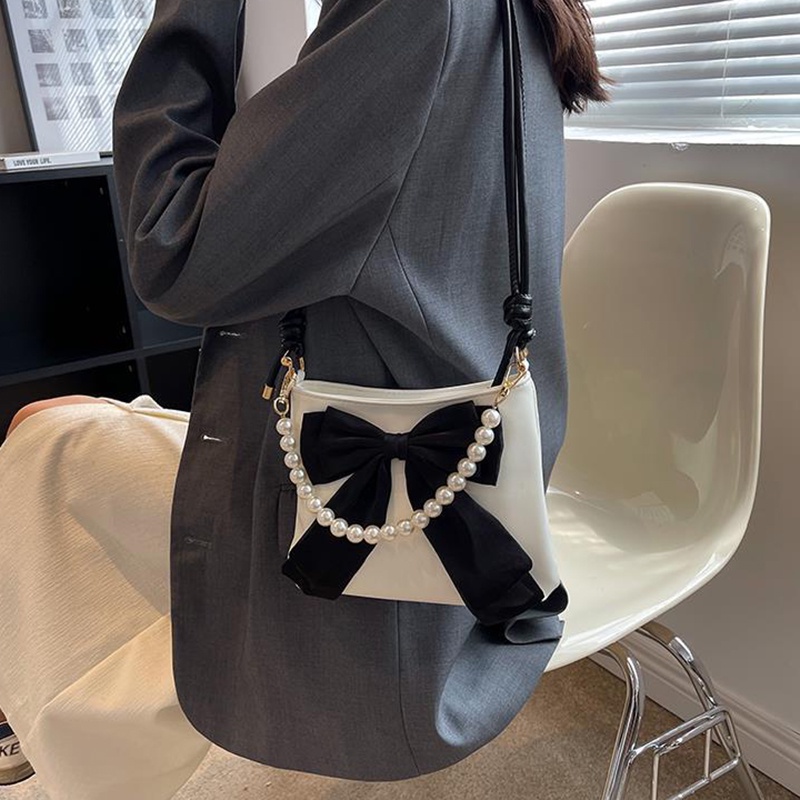 Túi đeo chéo Ielgy dạng xô thắt nơ thích hợp cho tất cả các phong cách dành cho bạn nữ