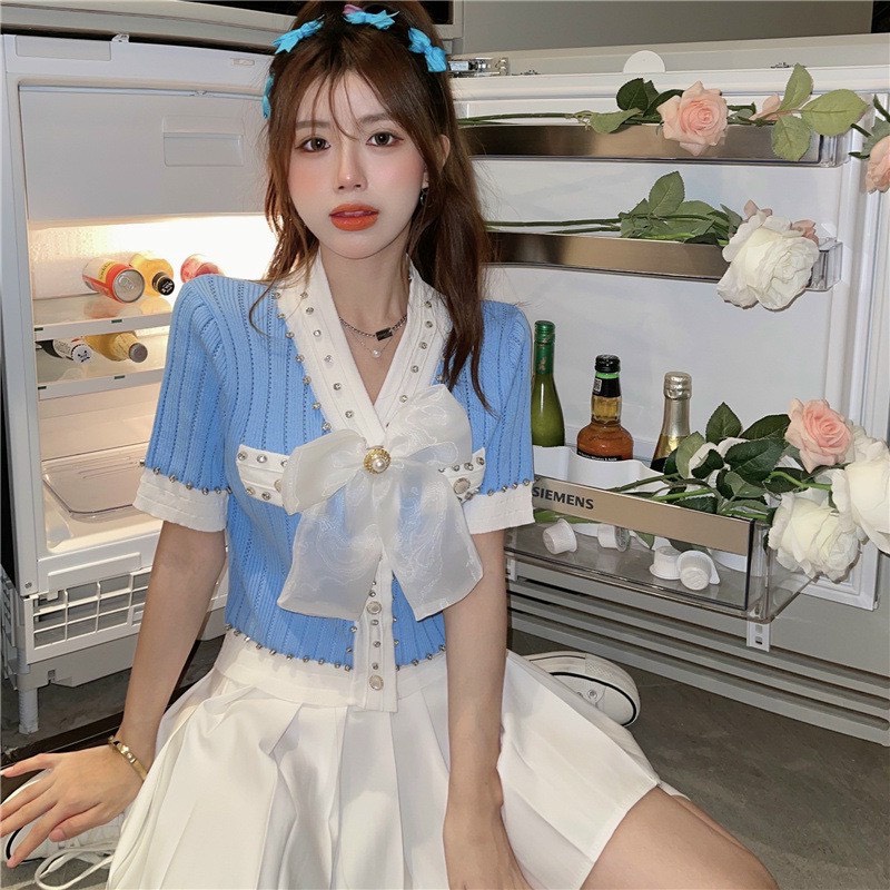 Áo len cổ đính nơ tiểu thư