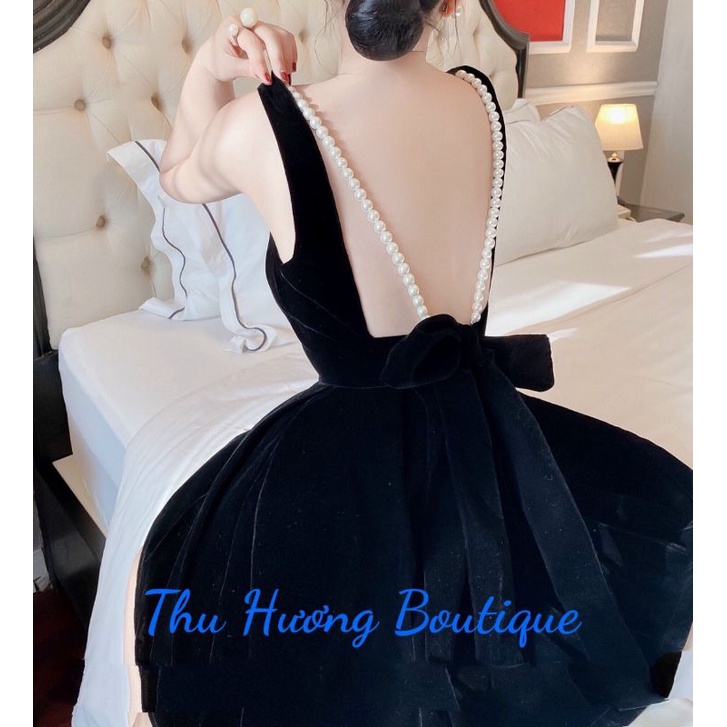 Váy xoè Nhung tim sâu 2 dây hở lưng.