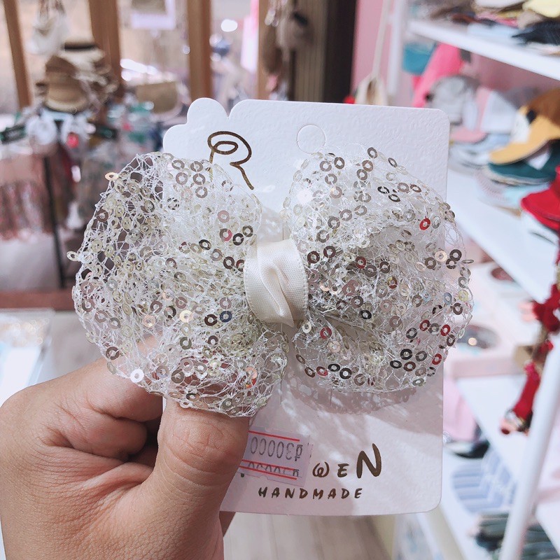 Kẹp nơ nhũ lấp lánh cho bé