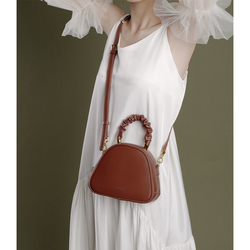 Túi xách nữ da trơn quai xoắn đeo chéo xách tay tông màu nâu hot trend 2022
