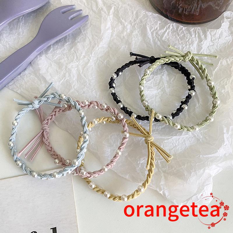 ORT-Vòng tay dây cao su bện ba sợi màu kẹo ngọc trai
