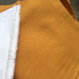 Vải linen bột màu vàng bò.